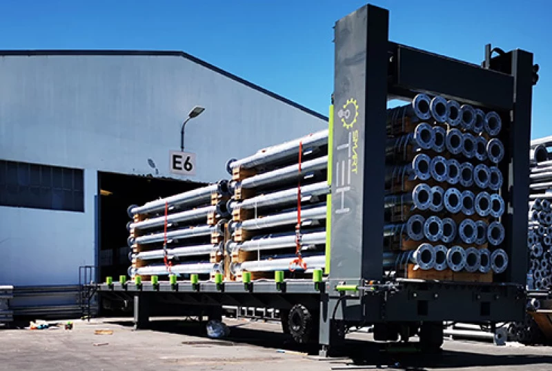 Container Loader with steel tubes on it