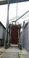 Shipping container loader