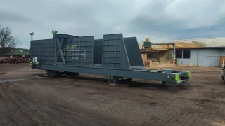 Shipping container loader