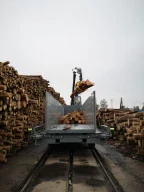 Container loading system for logs