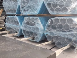 Steel pipes with straps for efficient unloading