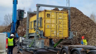 Tilting container for bulk unloading